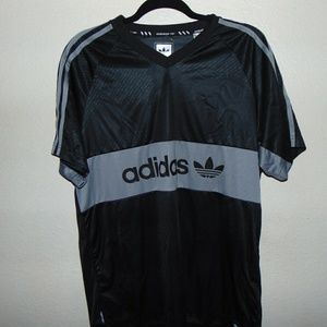 Adidas black t-shirt.
